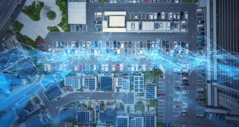 Foto von Digitalisierung über einem Parkplatz